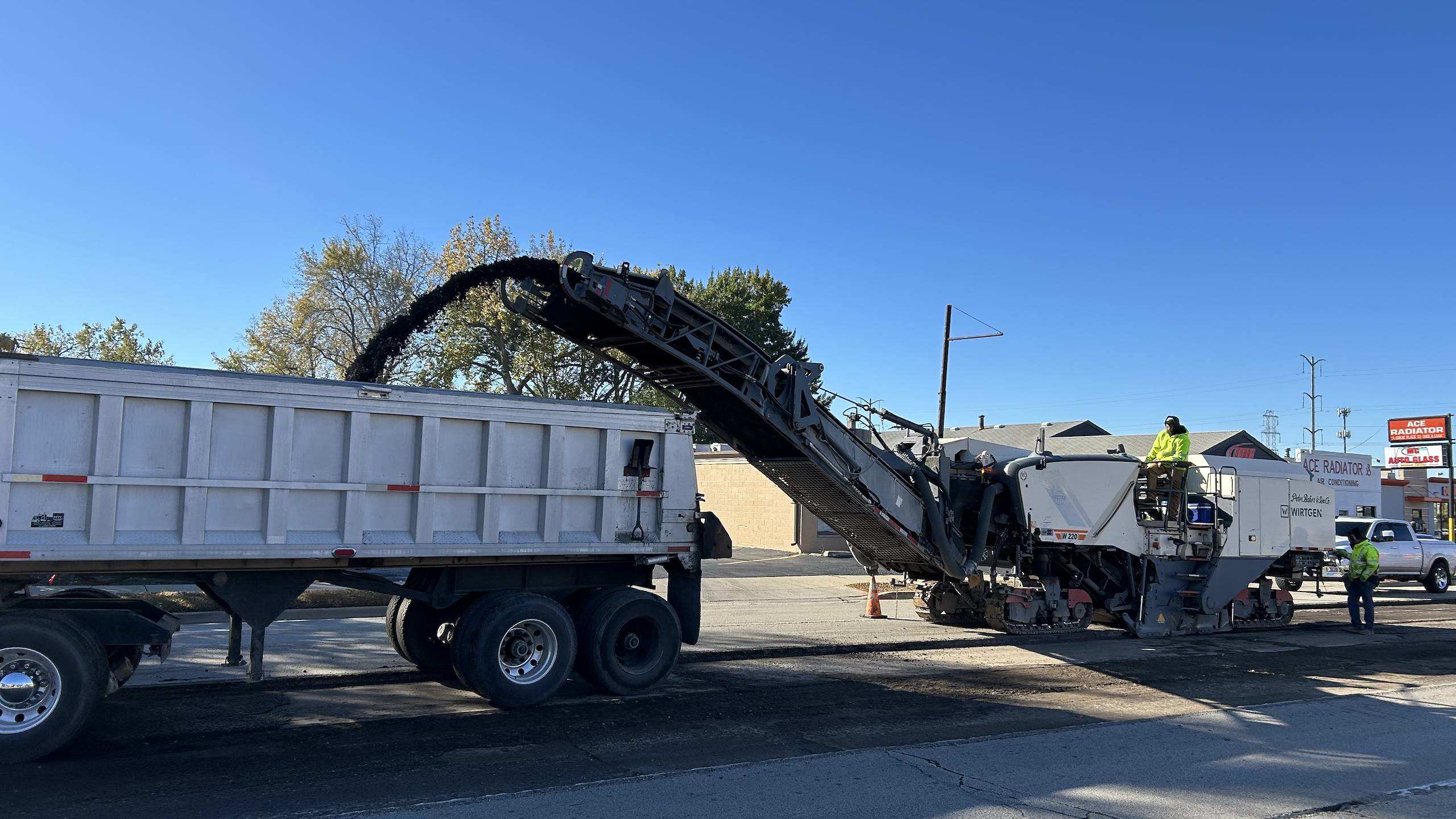 Road paving machine working on Waukegan street in Illinois.